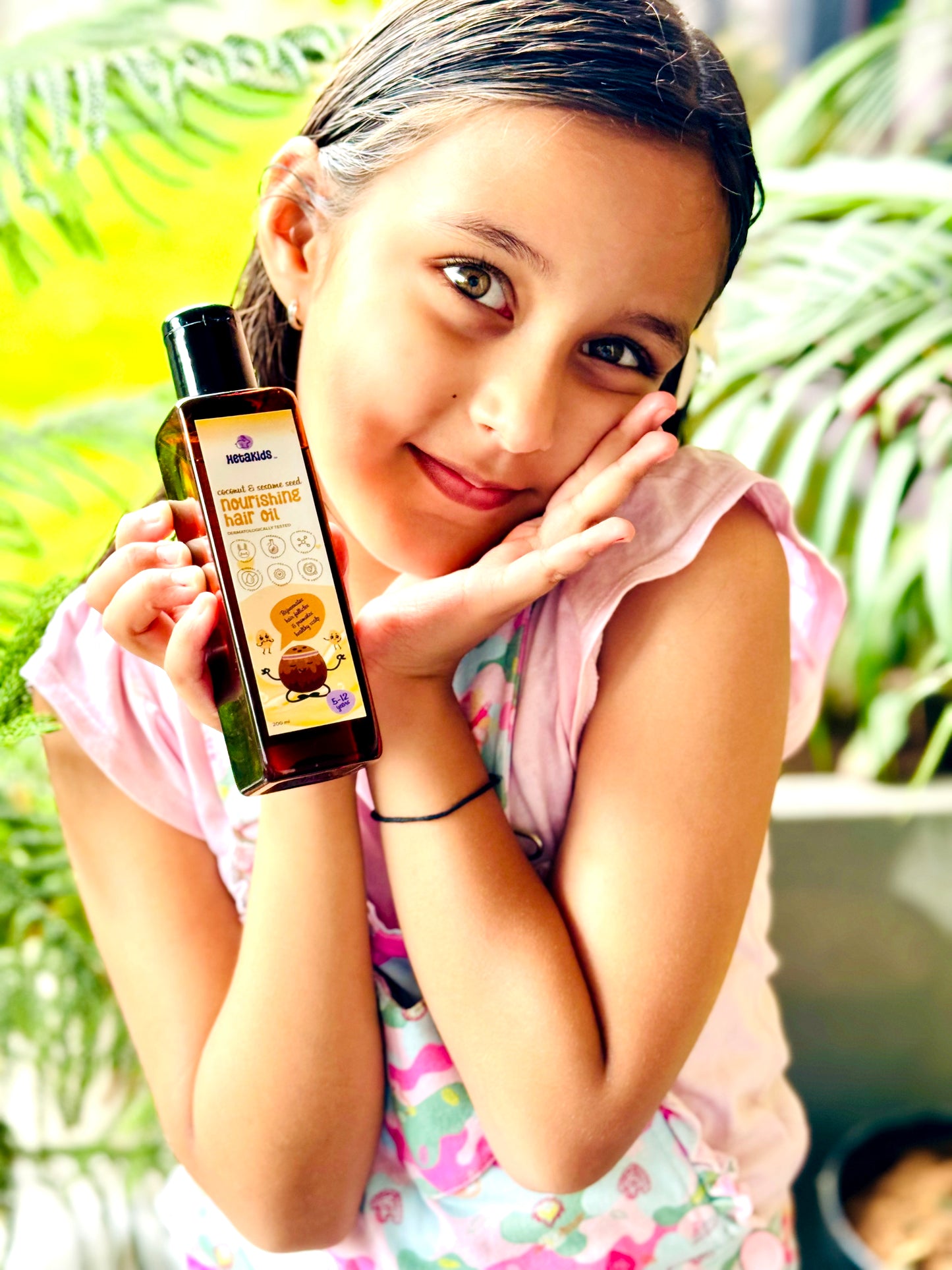 Nourishing Hair Oil with 12 herbs to promote Hair growth and hair strength to Kids.