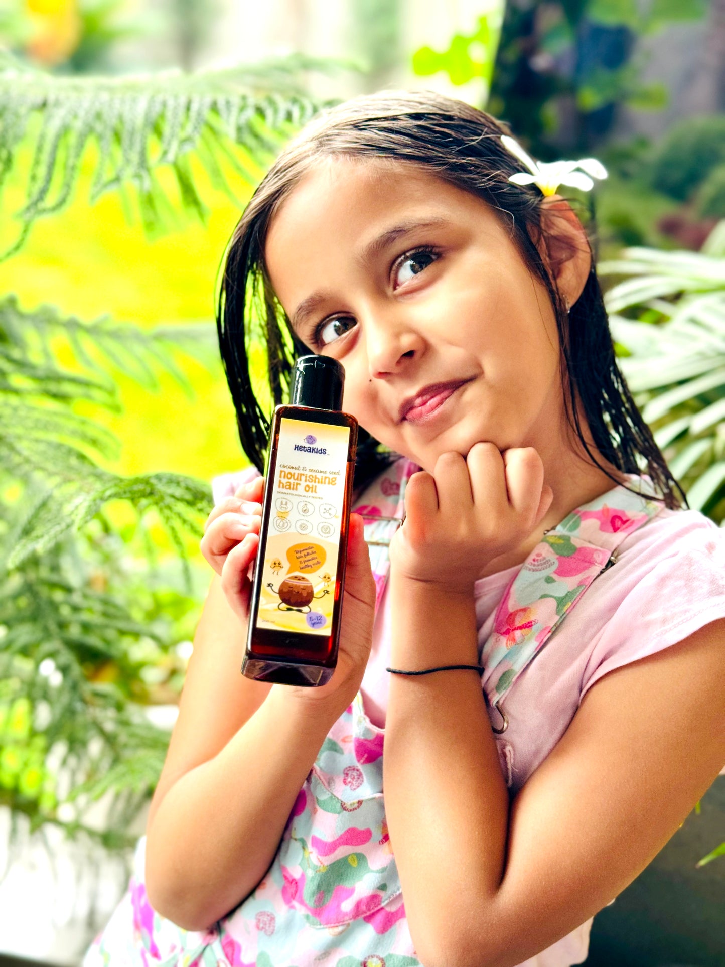 Nourishing Hair Oil with 12 herbs to promote Hair growth and hair strength to Kids.